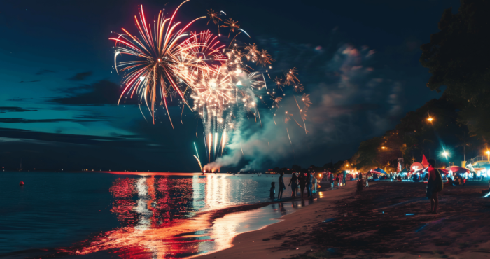 Personas disfrutando fuegos artificiales con responsabilidad
