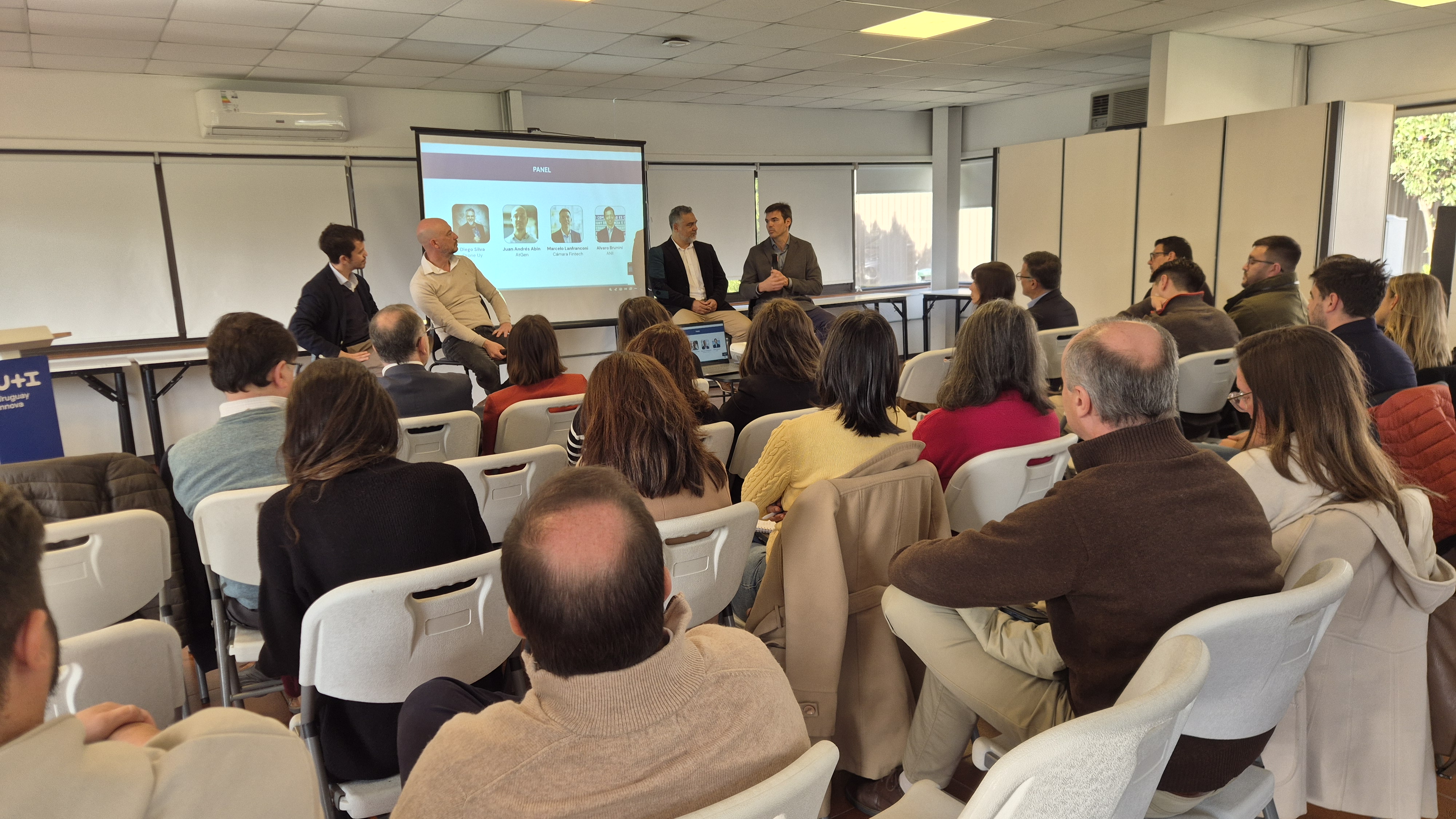 Alvaro Brunini, Marcelo Lanfranconi, Juan Andrés Abin y Diego Silva en un diálogo modo panel